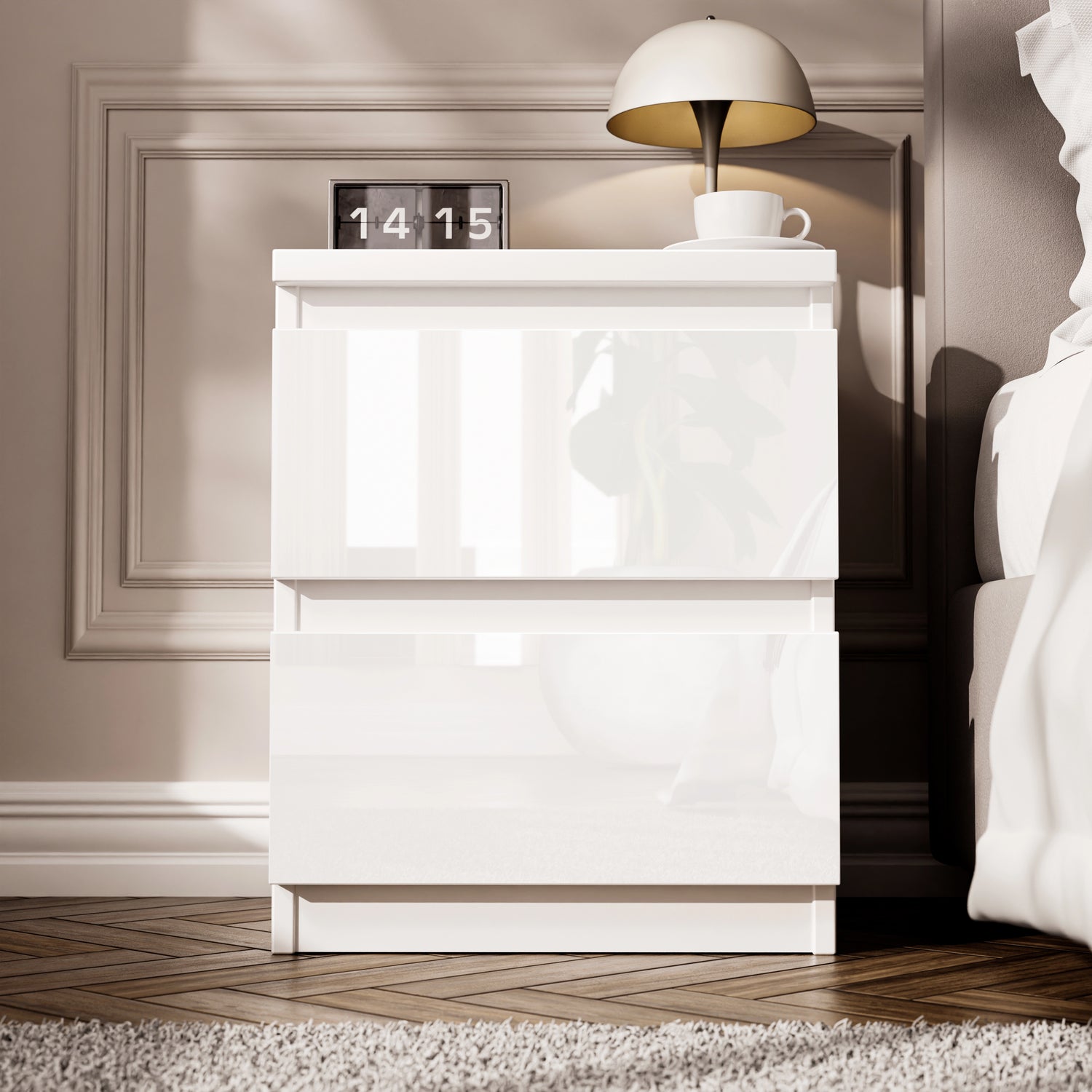 High Gloss 2 Drawer Bedside Table in white with modern design, placed beside a bed with lamp and clock, ideal for bedroom storage and decor.