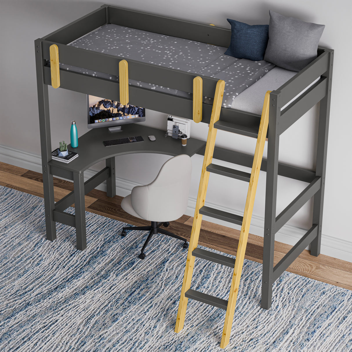 High single bunk bed with desk underneath and wooden ladder placed against a wall on a blue patterned rug