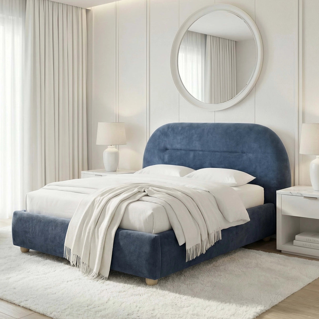 Side angle view of the king size blue bed frame, showing its design and structure in a stylish room