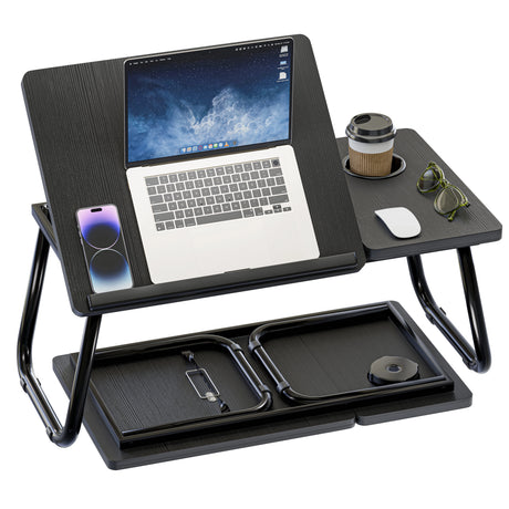 Black adjustable laptop stand with a laptop, phone, and other items on a white background