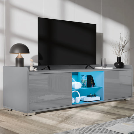 Modern TV stand with a television on a light wooden floor.