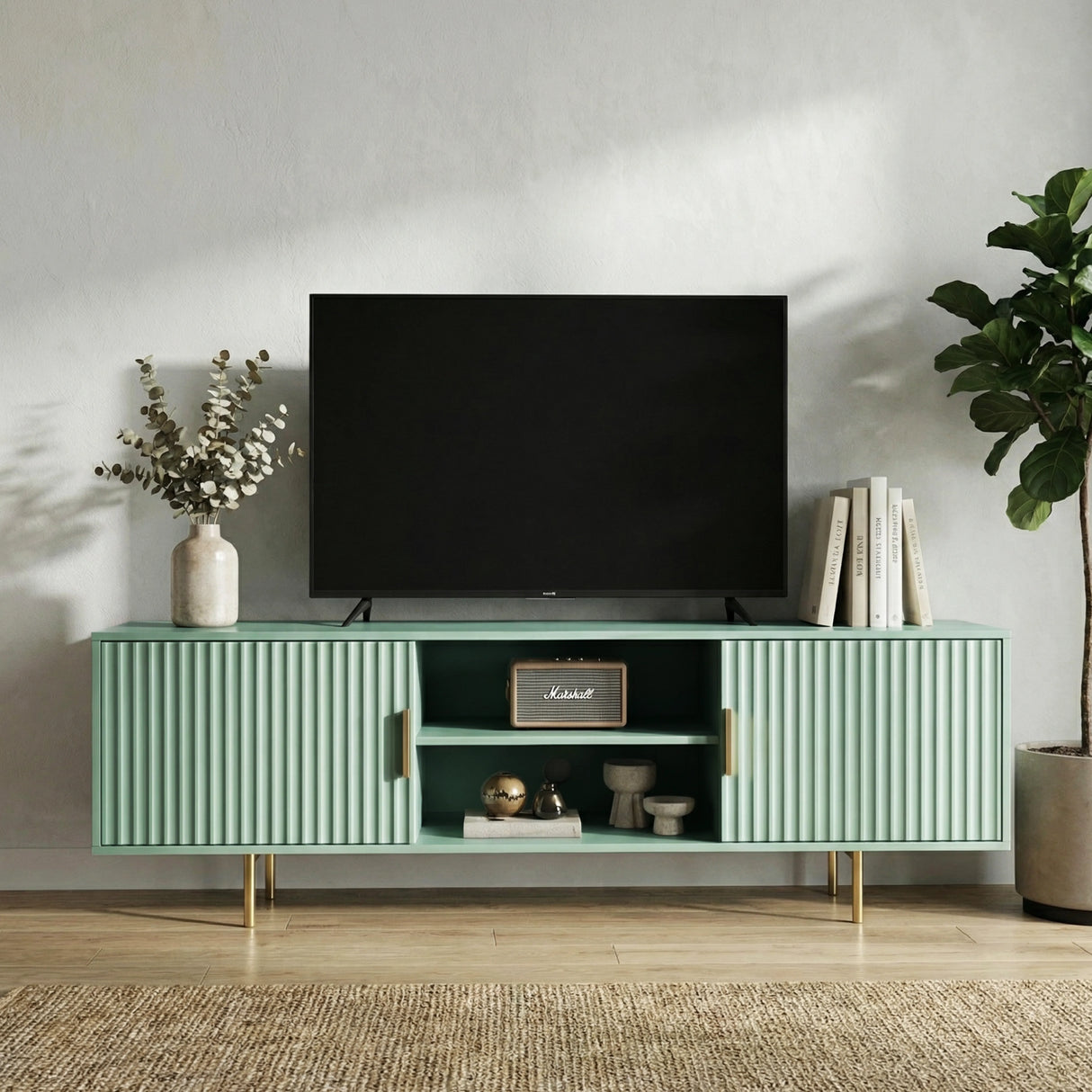 Grey TV unit with fluted doors styled in a modern living room with decor, creating a contemporary home aesthetic.