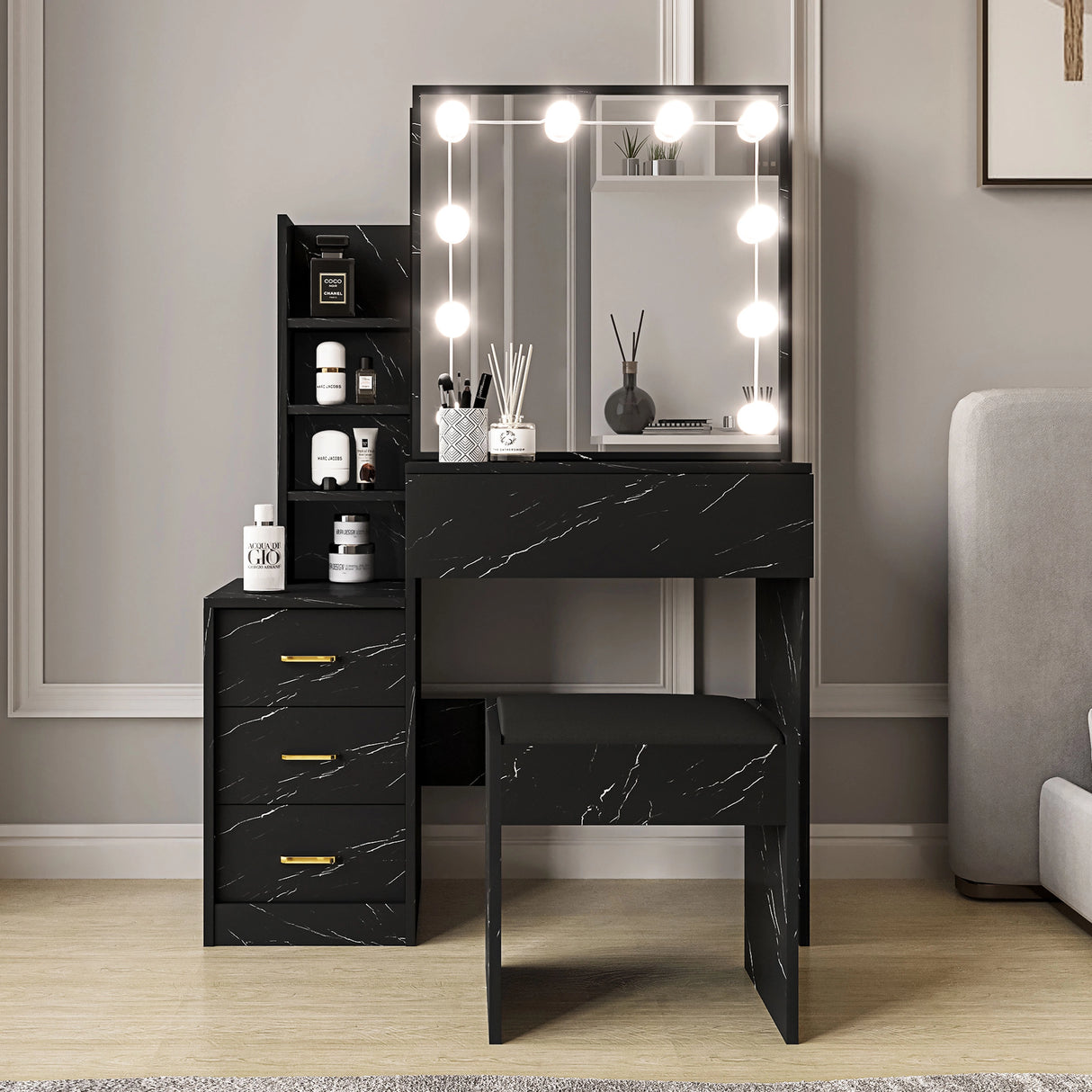 Black marble-patterned vanity table with mirror and lights in a room setting.