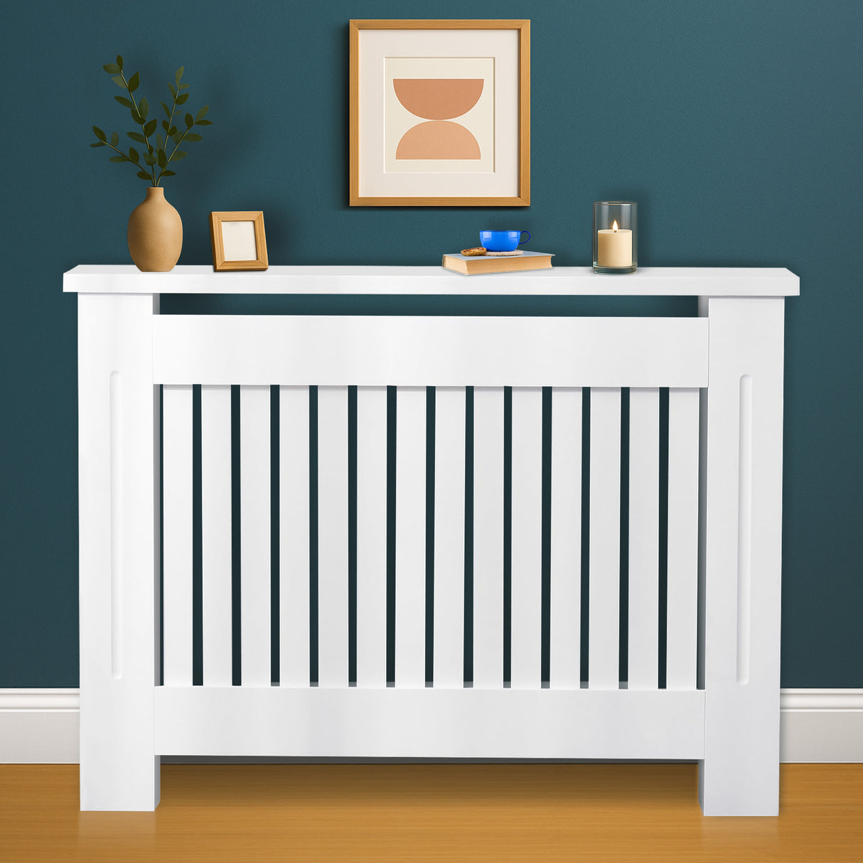 White radiator cover with decorative items on a blue wall background