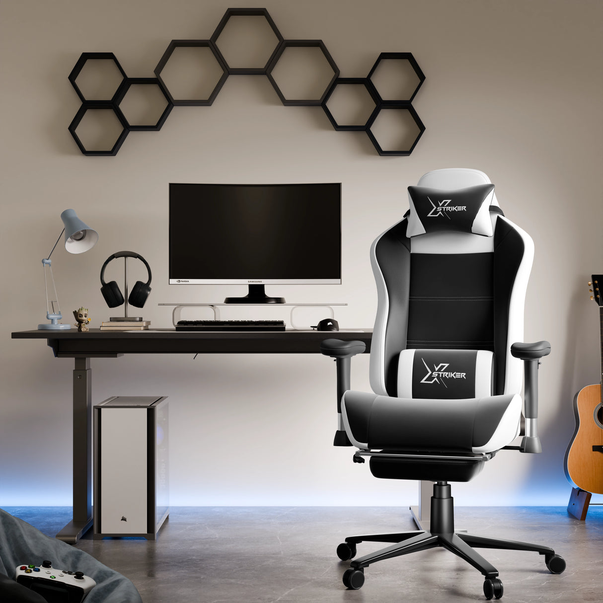 Modern gaming setup with a chair, desk, and computer monitor in a room.