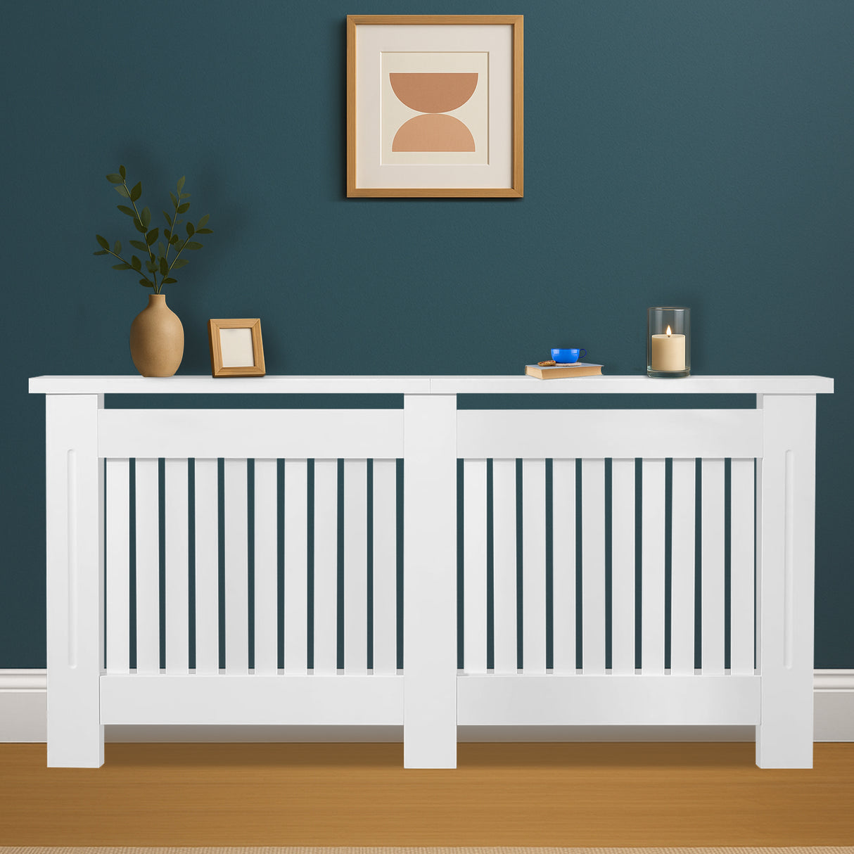 White radiator cover with decorative items against a blue wall