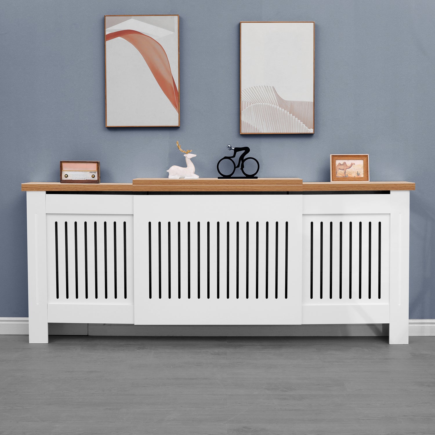 front-on image of radiator cover adjustable in white with oak top, styled with decor and clean lines