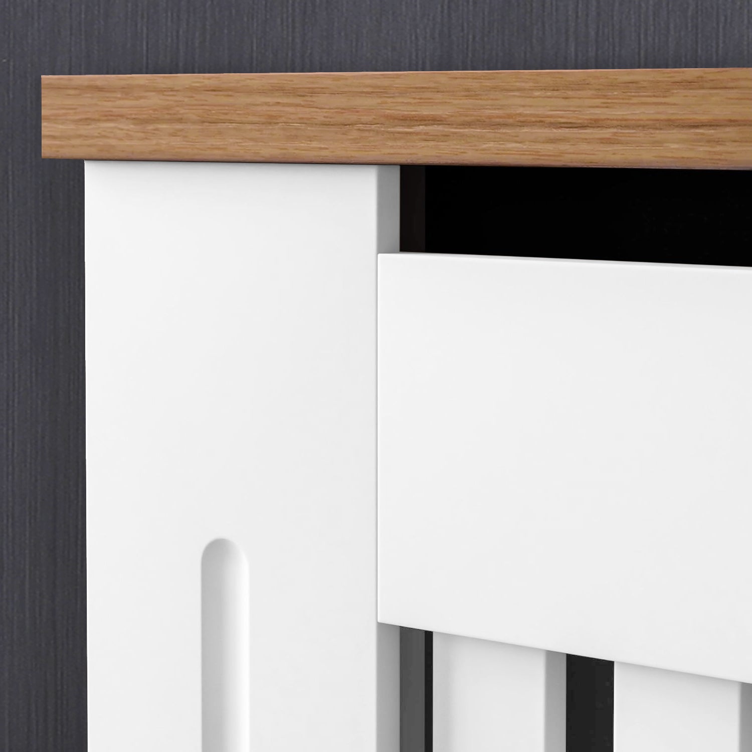 macro shot of smooth ventilation slats on white adjustable radiator cover highlighting its clean paint finish