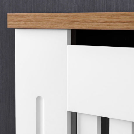 macro shot of smooth ventilation slats on white adjustable radiator cover highlighting its clean paint finish