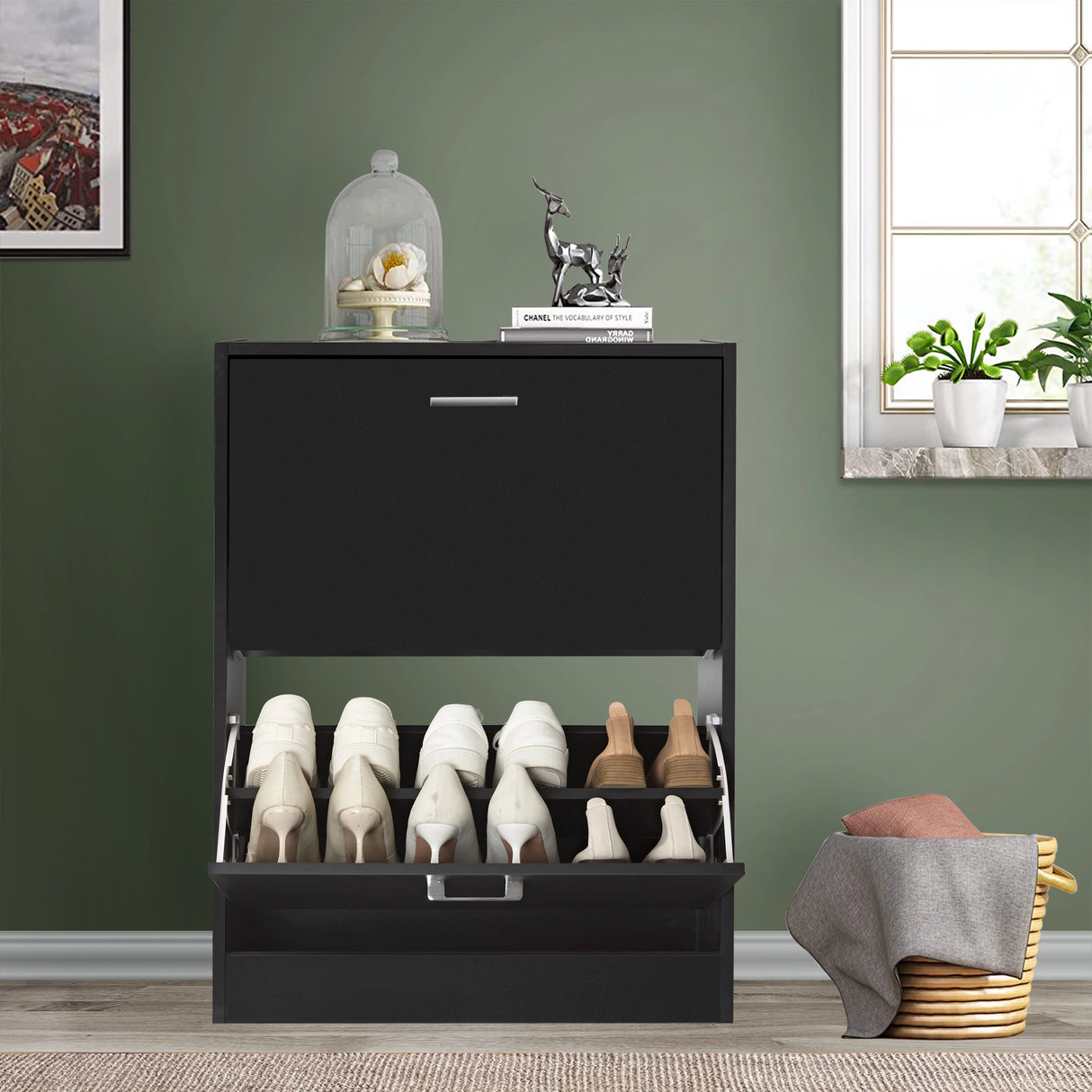 12 pair shoe storage cabinet in black, bottom drawer pulled down to reveal formal and casual footwear inside.