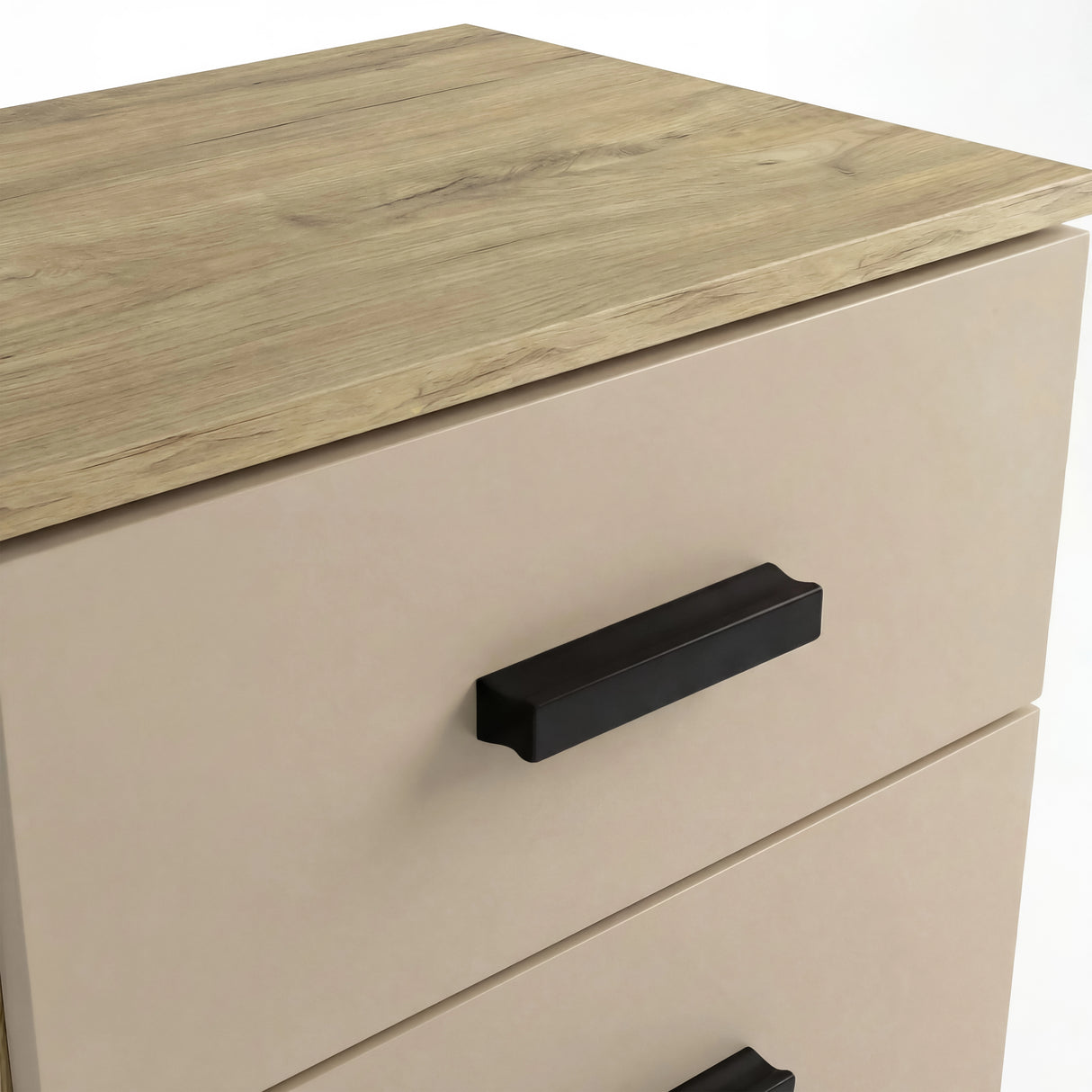 Close up of oak wood top surface and black horizontal handle on cashmere two drawer bedside table