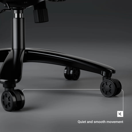 Close-up of a black office chair with wheels on a gray background