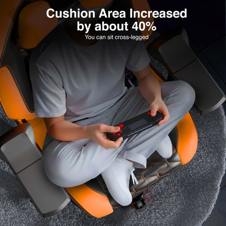 Person sitting on a massage chair with text indicating increased cushion area.