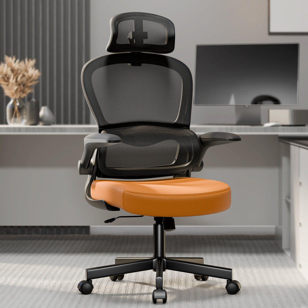 Orange and black comfortable office chair featuring breathable mesh and padded armrests for all-day use.