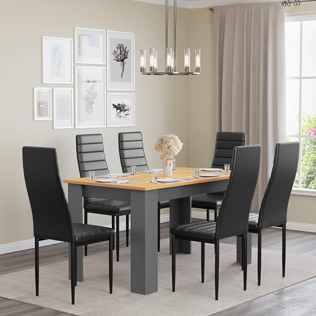 large pine dining table and chairs upholstered in black PU leather in a minimalistic dining room