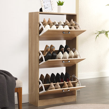 A fully loaded slim shoe cabinet for hallway shown fitted with 18 pairs of shoes in all three compartments.