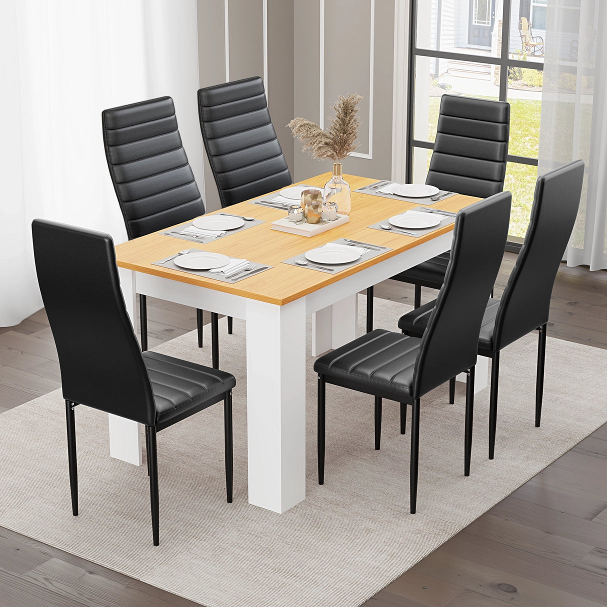 sleek black leather modern dining table and 6 chairs complementing white pine table in elegant dining space