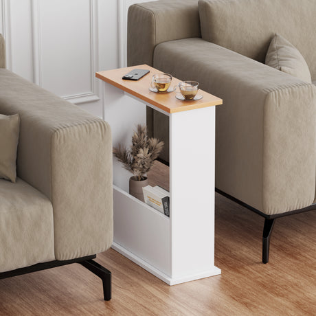 sofa side table placed between two sofas with coffee on top and magazine inside holder