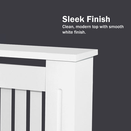 White crib with a sleek finish on a dark background