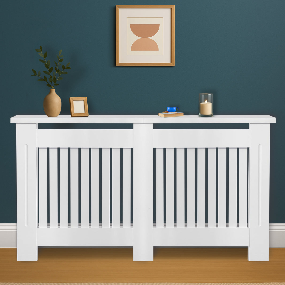 White radiator cover with decorative items against a blue wall