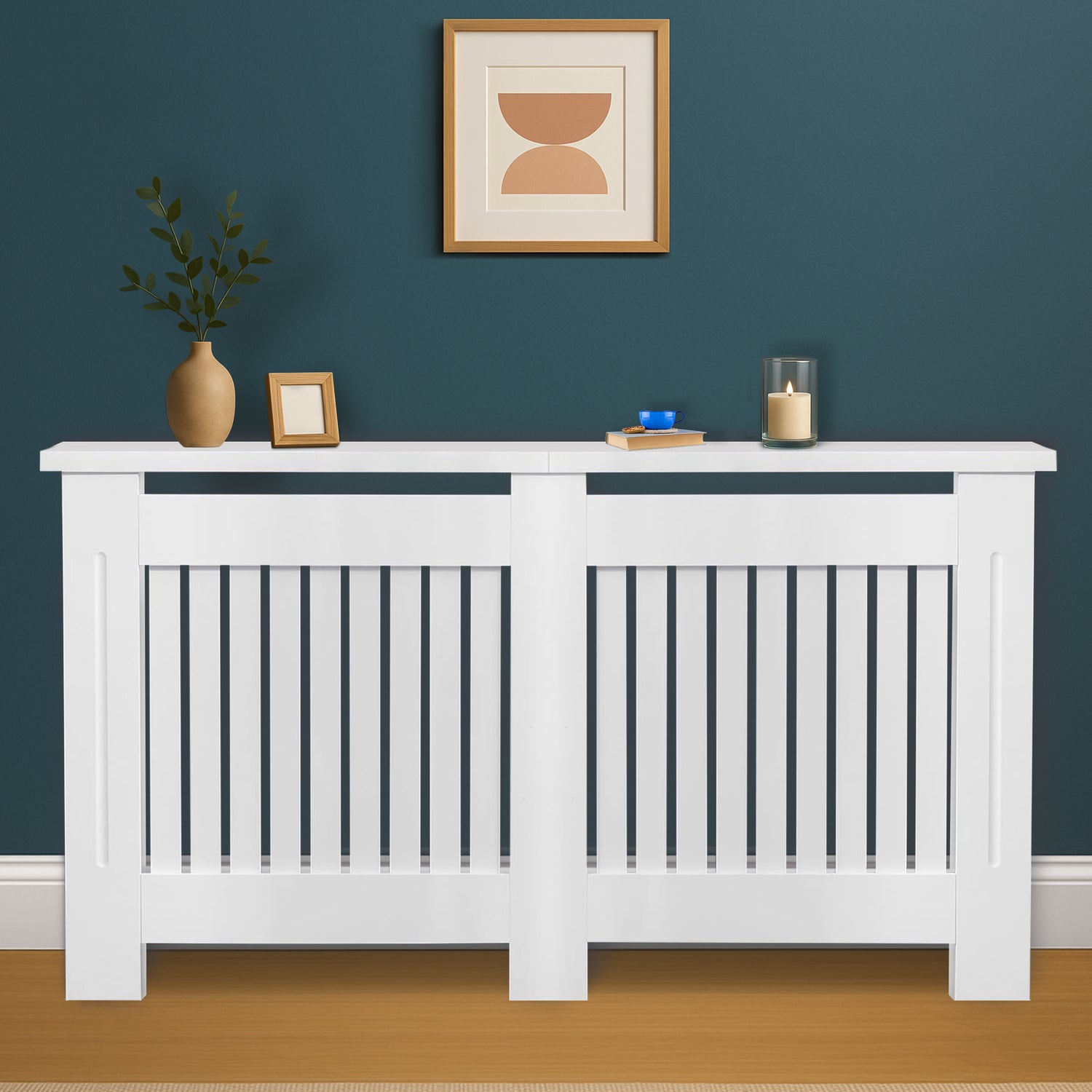 White radiator cover with decorative items against a blue wall