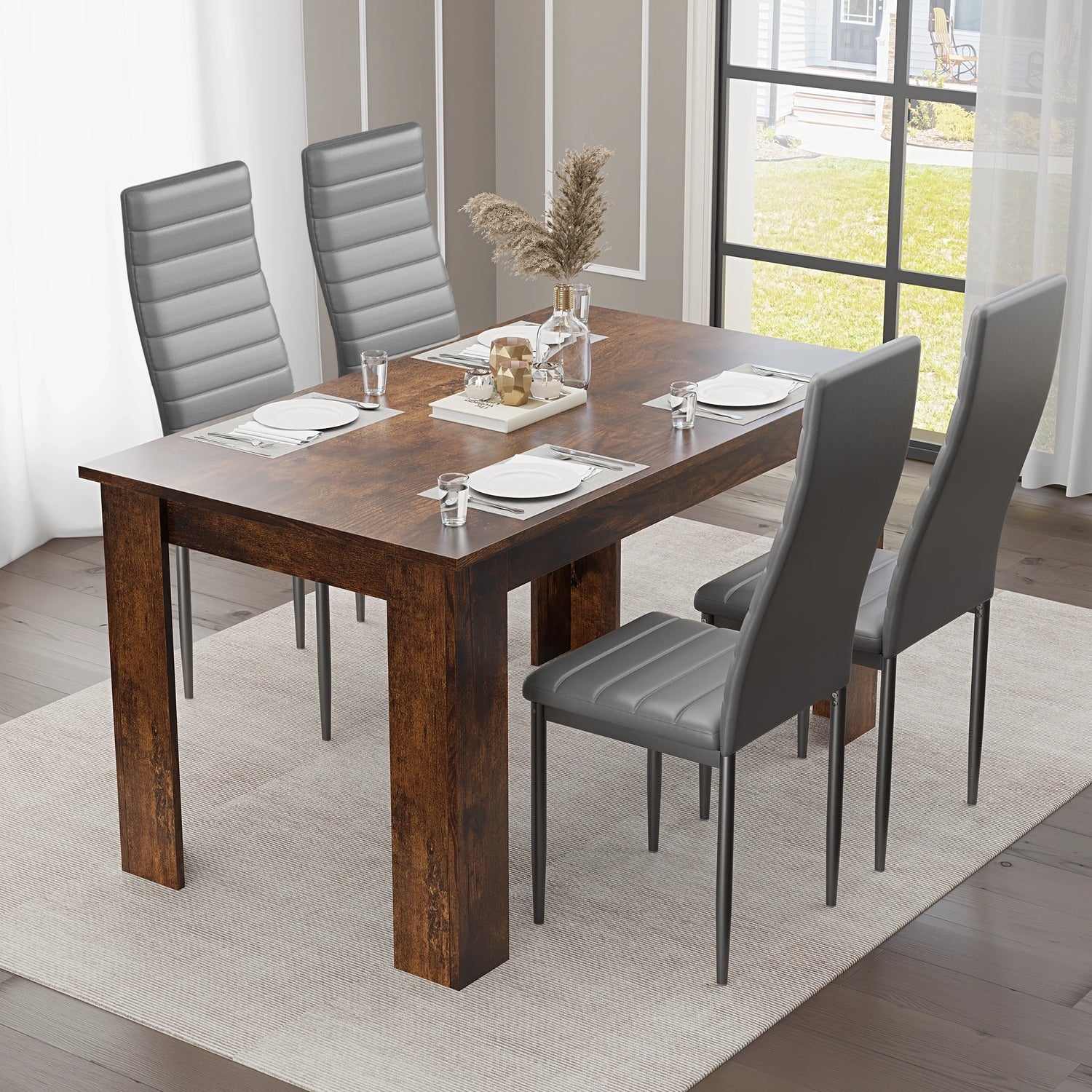 minimal dining room tables sets layout with grey leather chairs and a rustic wood table, styled with pampas centerpiece