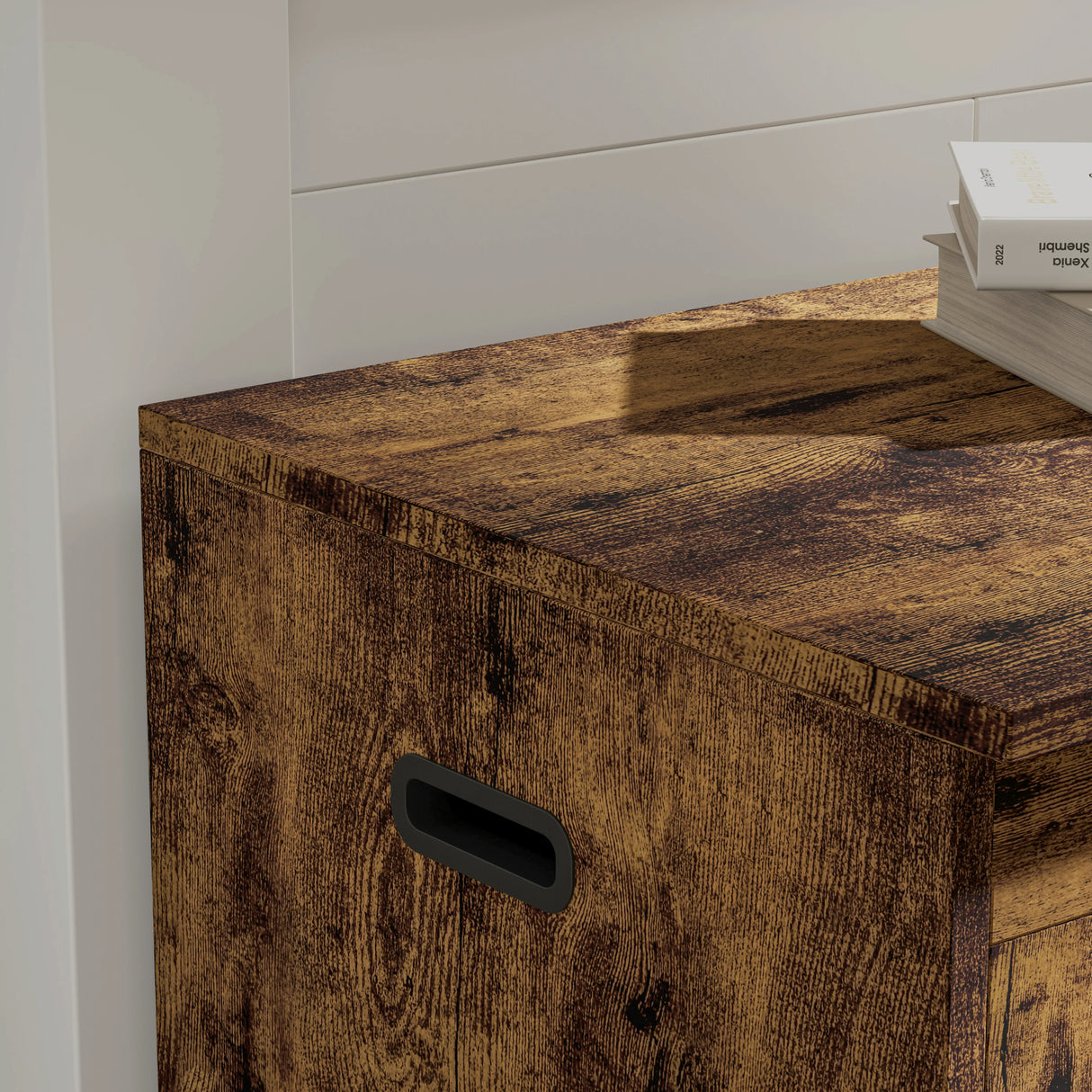Wooden storage box with a handle on a white background
