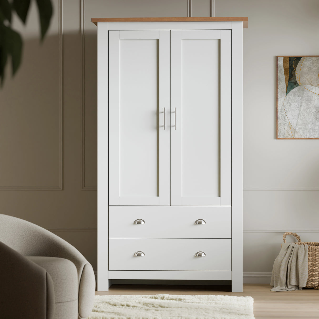 Front view of shaker double wardrobe with drawers in bottom and metal handles, placed in a well organised space