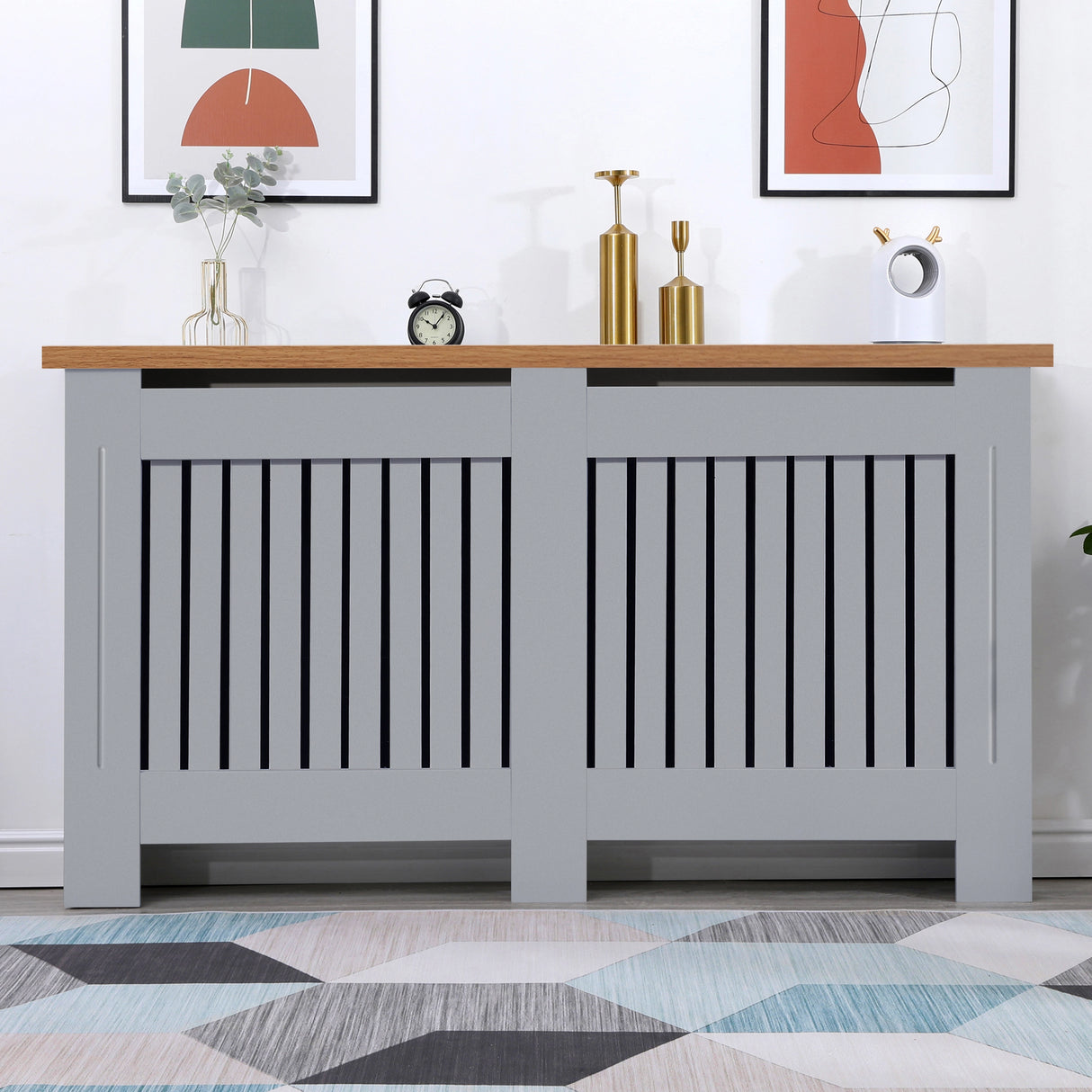 Large oak radiator covers in grey shown from the front in a living room, adding warmth and a clean finish to the decor.