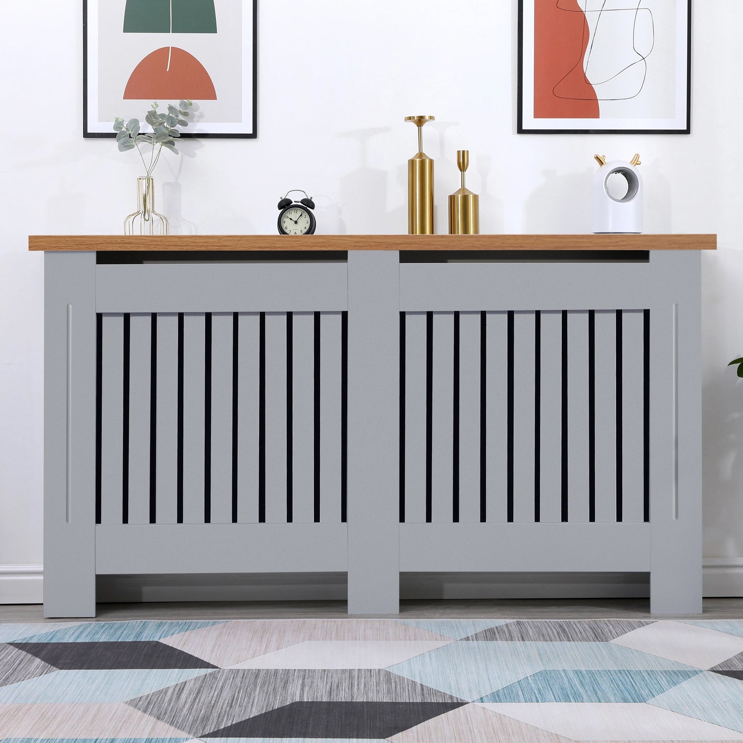Large oak radiator covers in grey shown from the front in a living room, adding warmth and a clean finish to the decor.