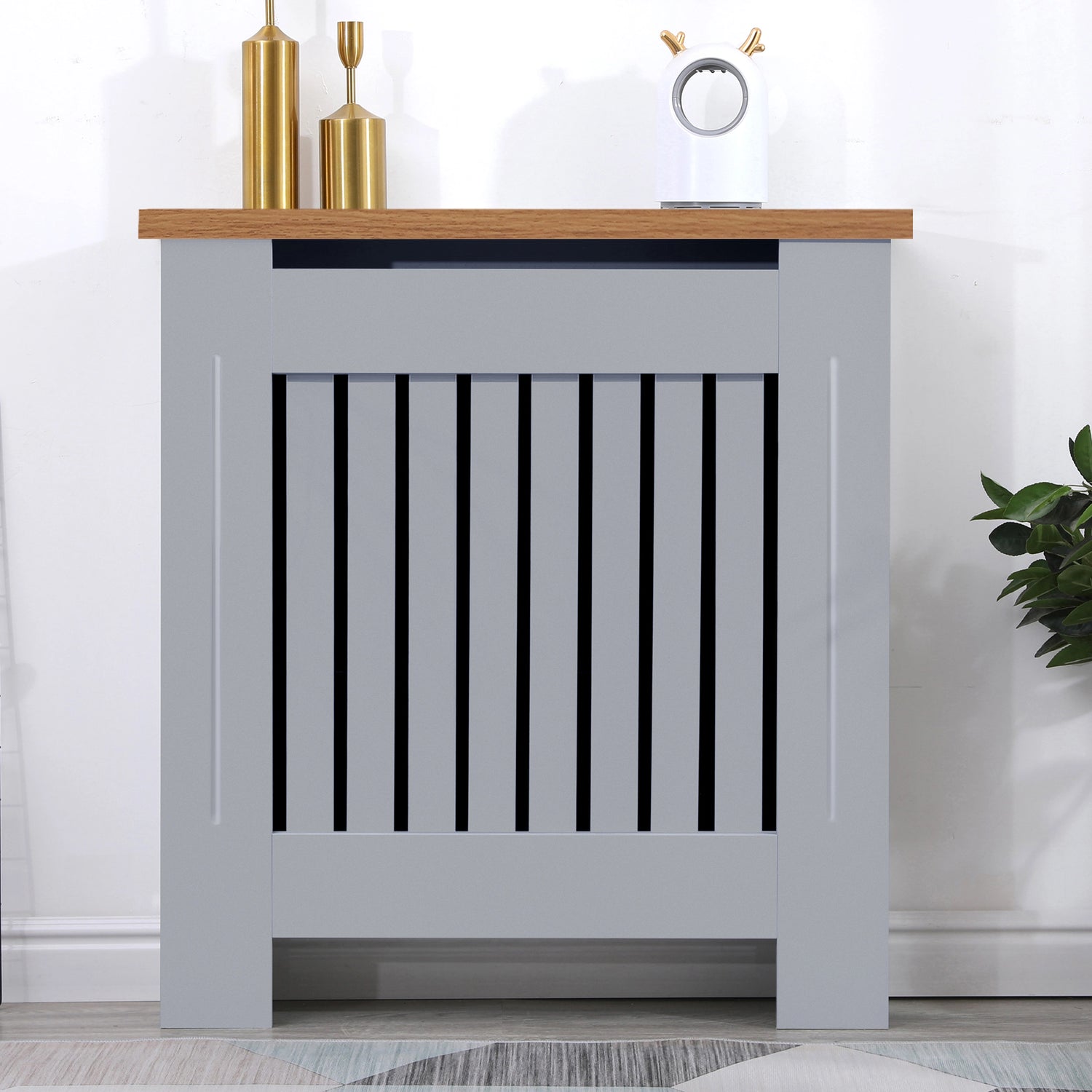 Front view of small radiator covers in grey with oak top, perfect for compact hallway or entryway spaces.
