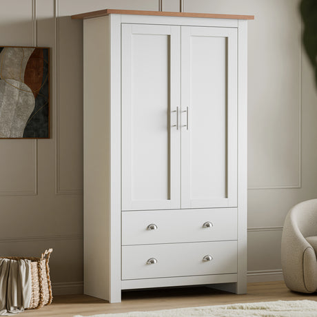 Shaker double wardrobe with drawers and hanging space in white finish, featuring two doors and two lower drawers for bedroom storage.