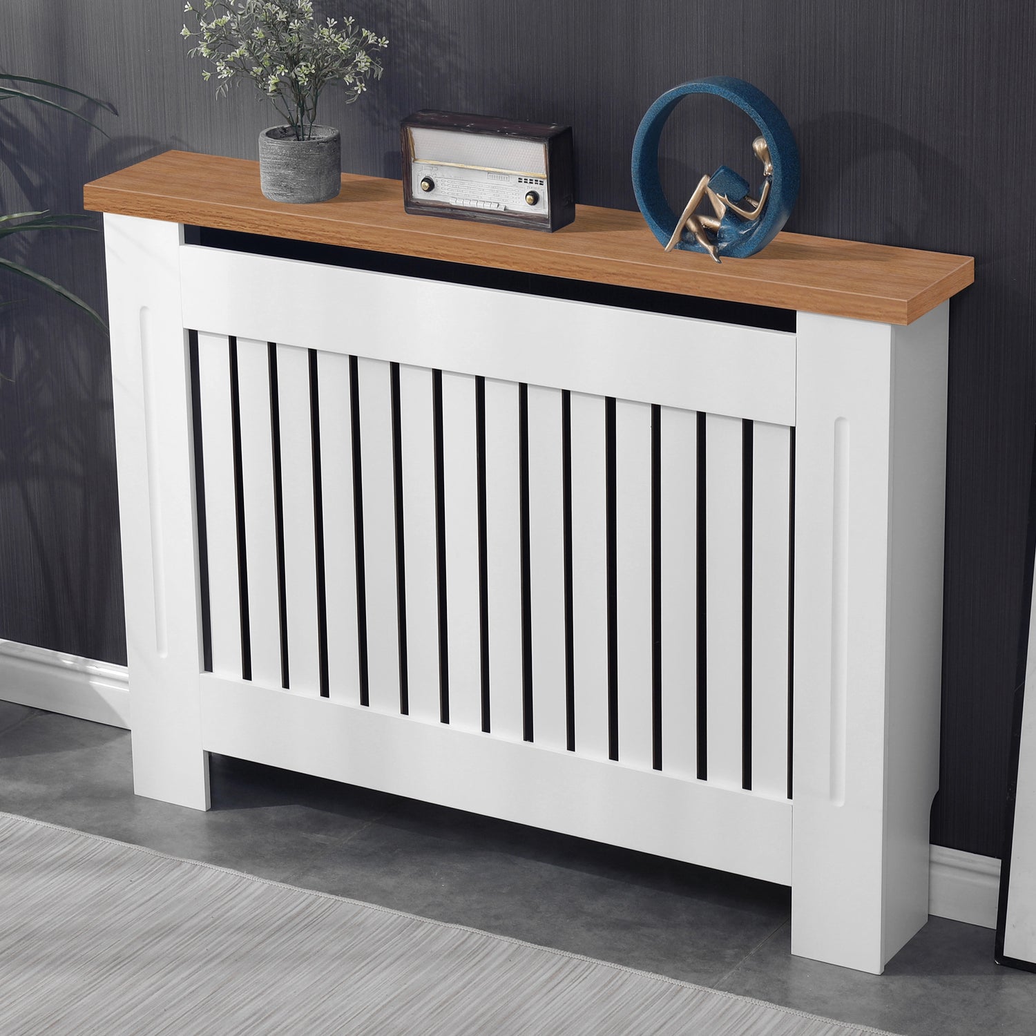 Medium oak radiator cover with white finish displayed in a cozy living room, combining form and function.