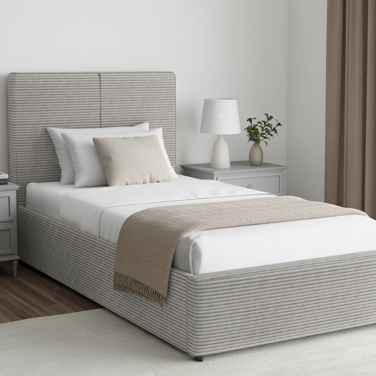Corduroy ribbed velvet upholstered ottoman bed frame with storage in light grey, single size, shown in a modern bedroom with neutral decor.
