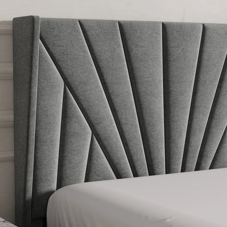 Close-up of a textured white headboard with decorative elements on a neutral background