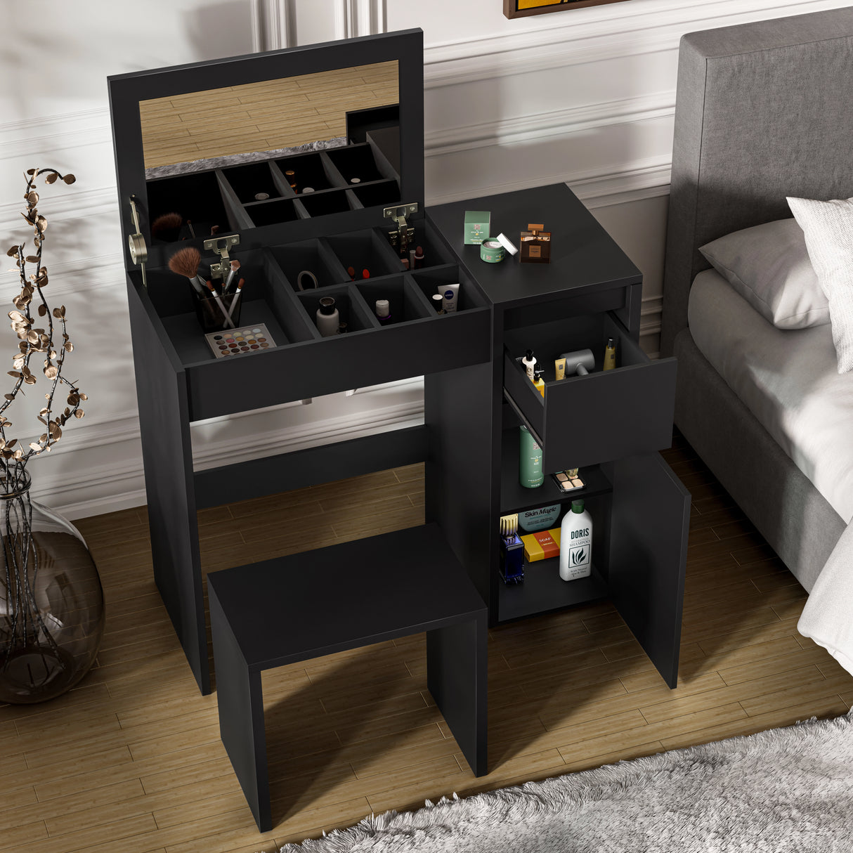 Black makeup dressing table with flip-up mirror, storage compartments, drawers, and matching stool, ideal for modern bedroom vanities.
