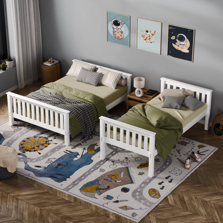 Children's bedroom with two white beds, green bedding, and a colorful rug.