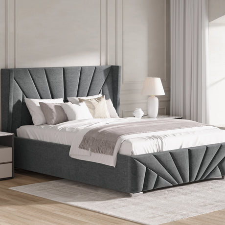 Gray upholstered bed with white bedding in a modern bedroom setting.
