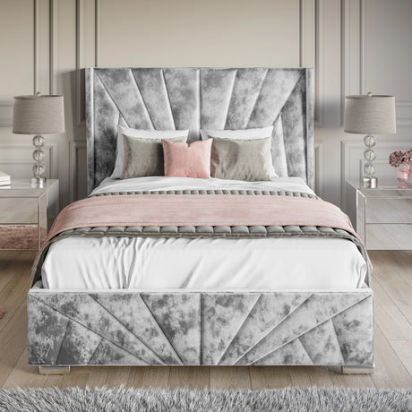 Crushed Velvet Ottoman Storage Bed Silver Sunrise Bed Frame with end lift-up storage, featuring a modern panelled headboard and plush finish.