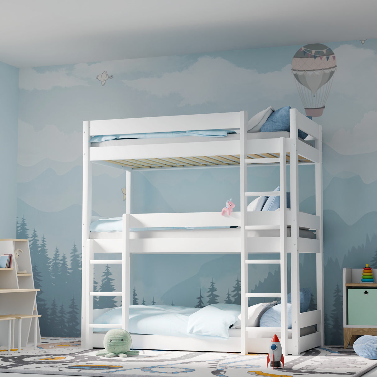 Front-facing white triple sleeper bunk bed at angle, with secure ladders, guard rails and pine wood structure