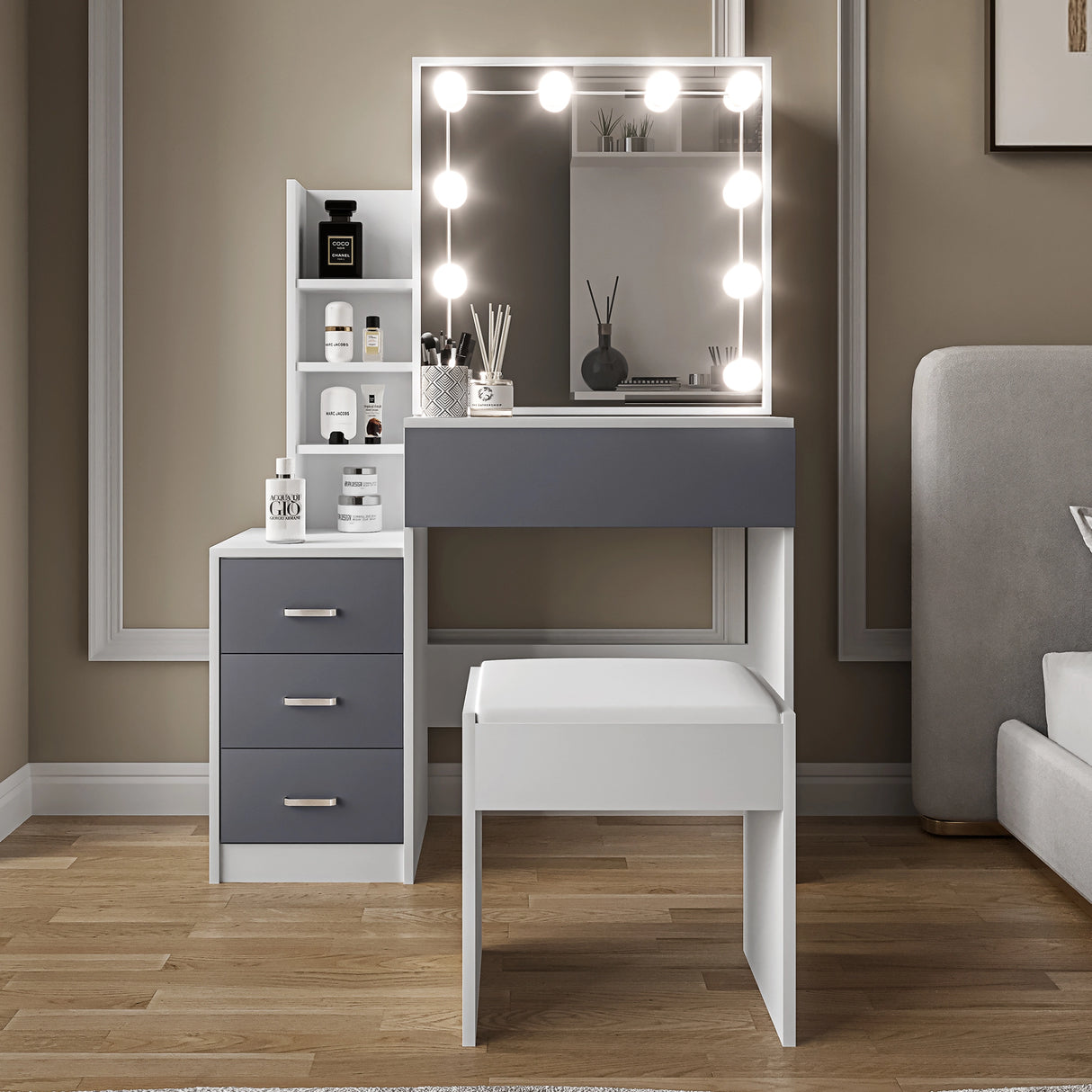 front view of vanity table with mirror and lights placed against a wall in a modern room setting