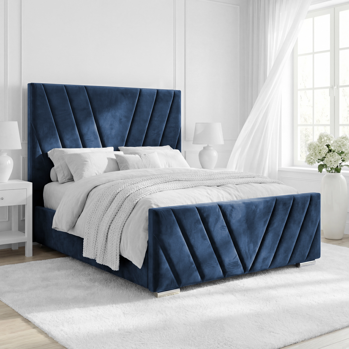 Side view of the velvet blue king-size ottoman bed frame, showcasing its luxurious velvet upholstery and clean design