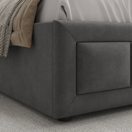 Grey storage bed with footboard, offering stylish storage and comfortable seating.
