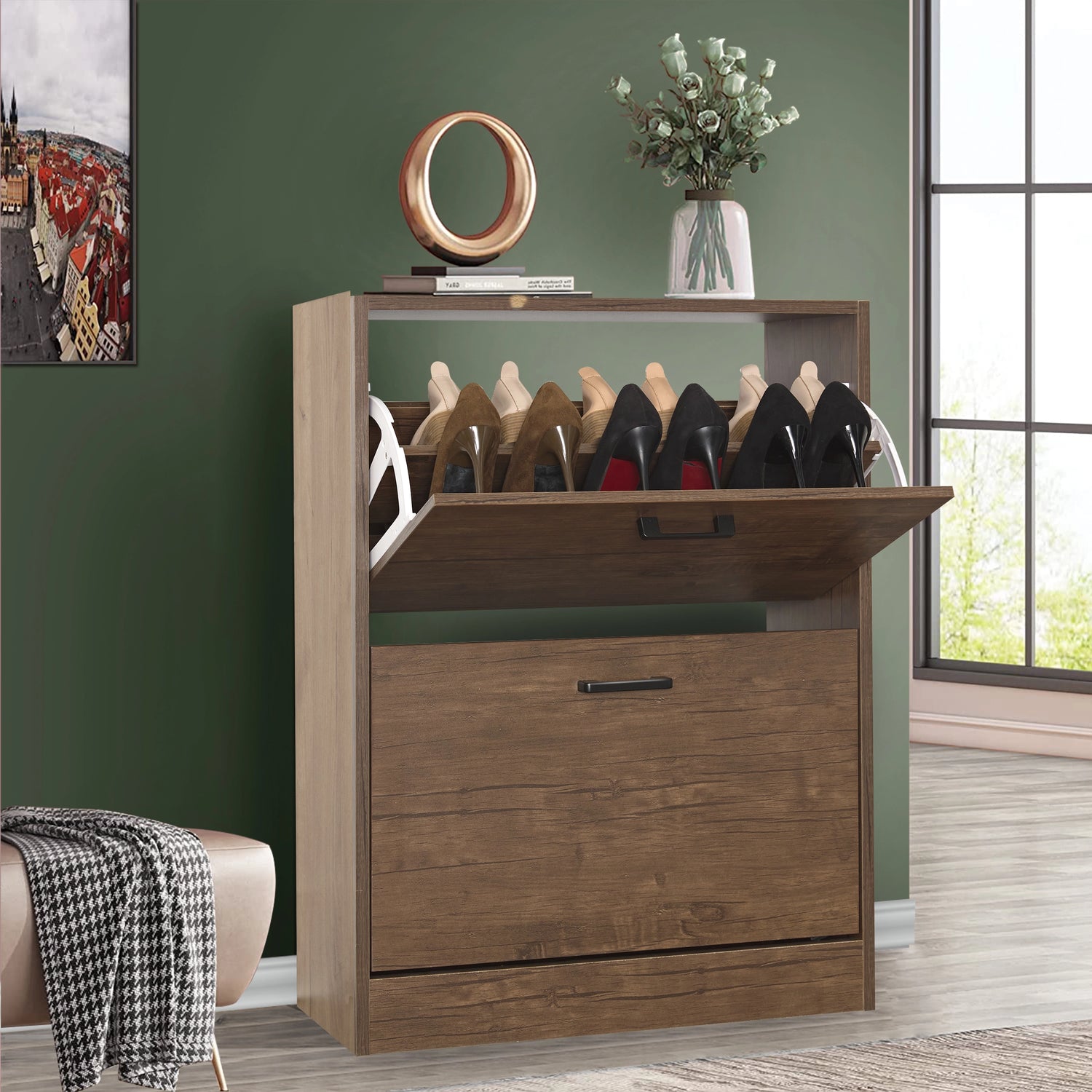 Walnut shoe cabinet 2 door with pull-down drawer open, styled with indoor plant and decorative pieces above.