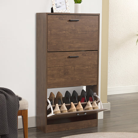 Walnut shoe cabinet with a 3 tier shoe cabinet layout with shoes neatly stored in the bottom drawer.