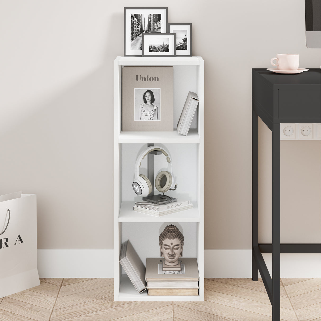 front view of white slim bookcase showcasing neat shelves with books and art pieces for modern spaces