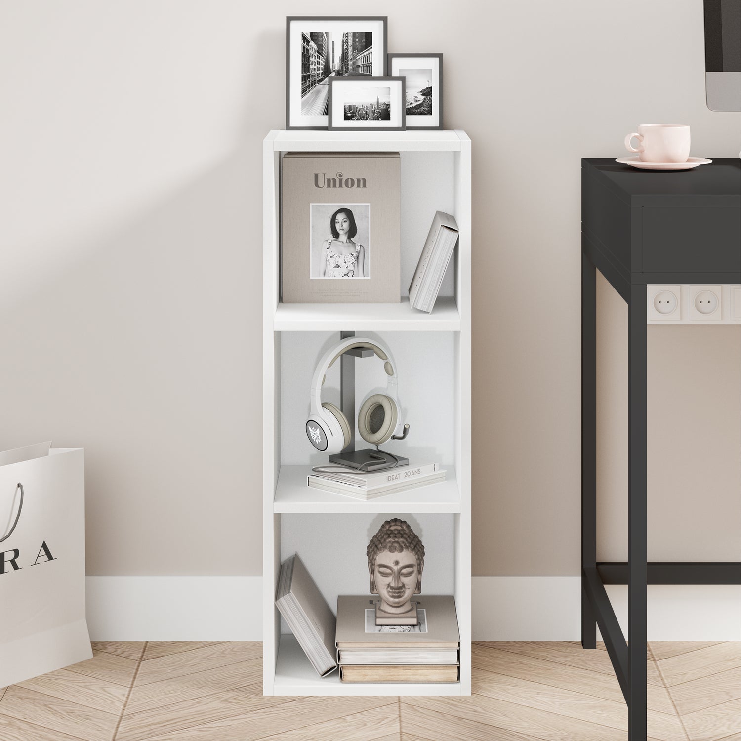 front view of white slim bookcase showcasing neat shelves with books and art pieces for modern spaces