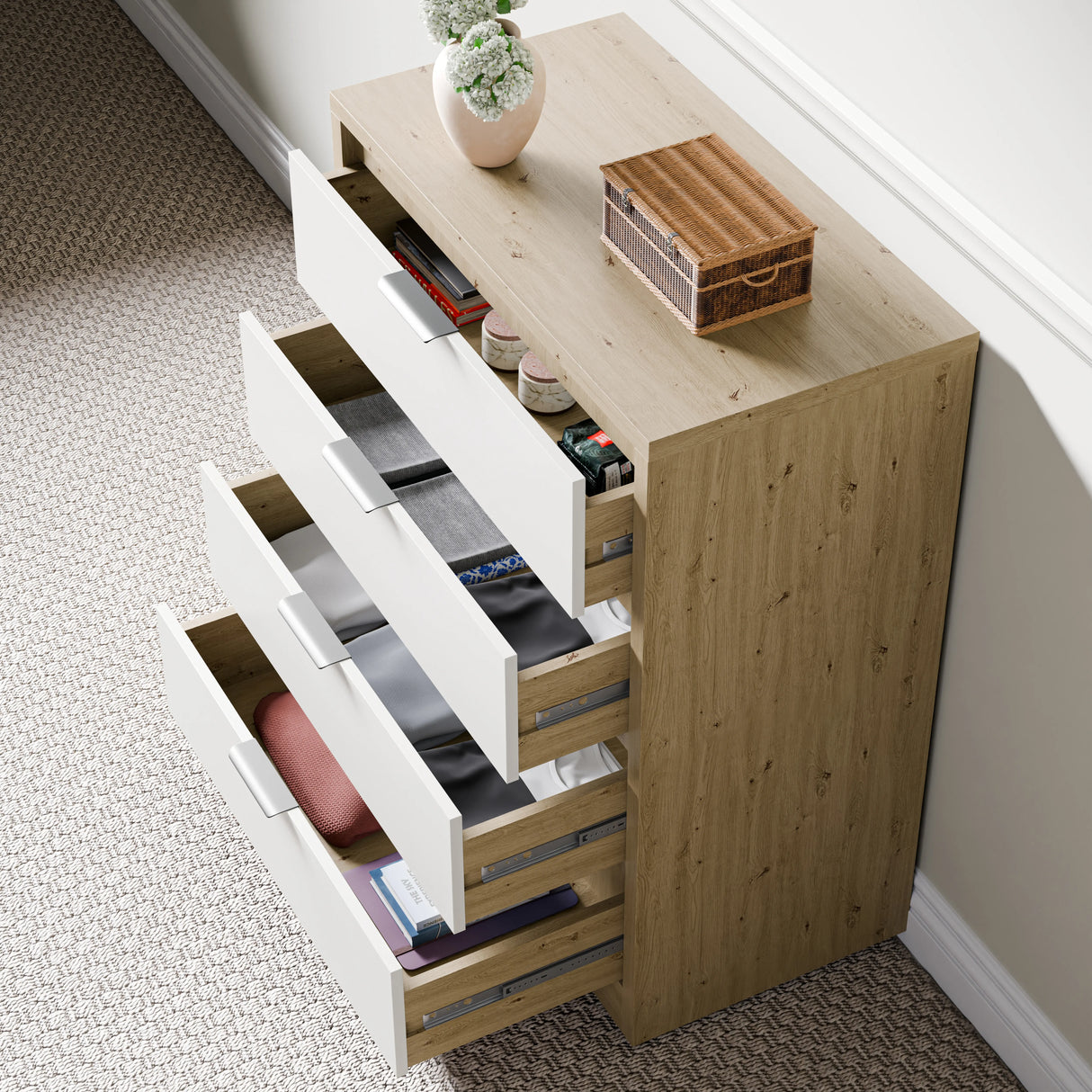 Skova 4 Piece Bedroom Set chest of drawers in oak and white finish with five open drawers showing organized storage for clothes and accessories.