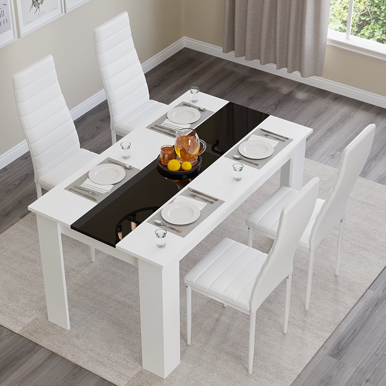 top to bottom view of small dining table set for 4 with white gloss and black striped table and white chairs arranged neatly