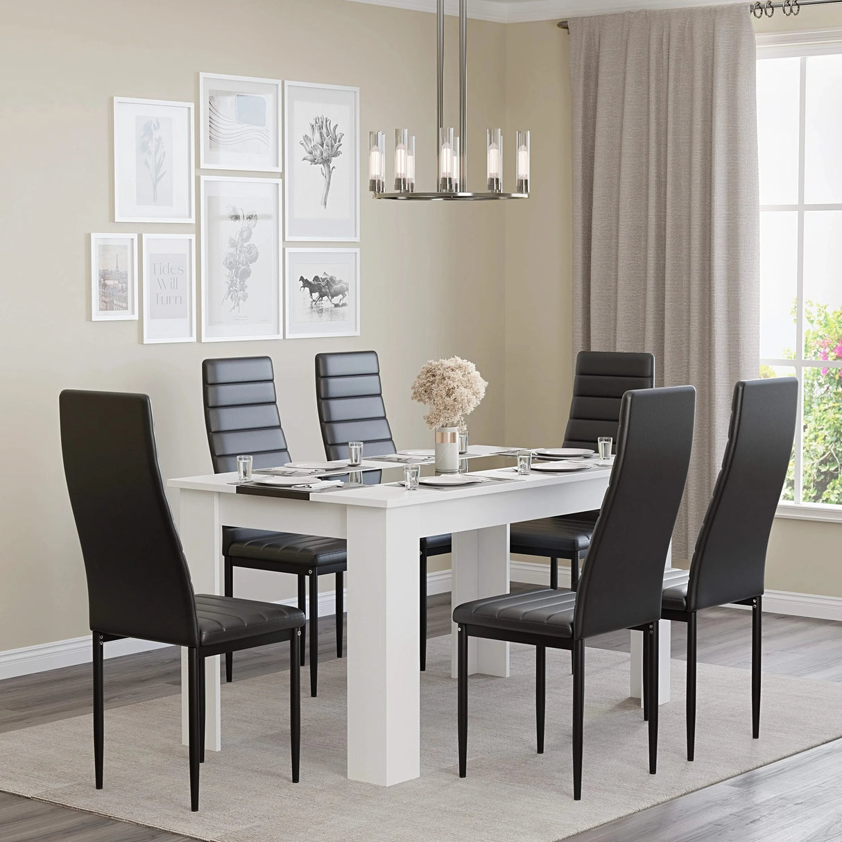 large dining table and 6 chairs with gloss white and black striped table paired with black leather seats